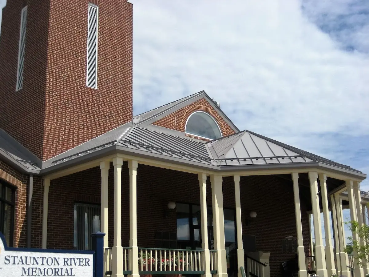 Skilled roofing craftsmen working on a residential roof in Culver-West